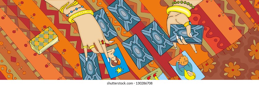 Hands of the fortuneteller on a ornamental background