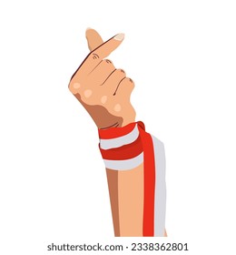 hands gesturing love sign wearing Indonesian red and white ribbon. Indonesia's independence 17 agustus 1945