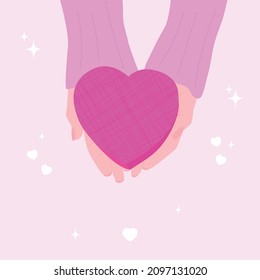 In the hands of the gift of a heart vector. Holiday, valentine's day