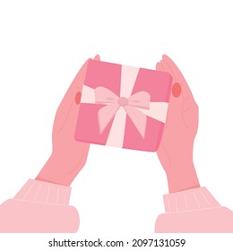 En manos de un vector de regalo. Fiesta
