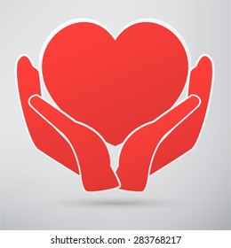 Hands and heart. Icon of kindness and charity