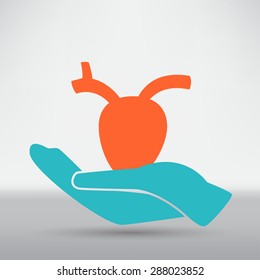 Hands and heart. Icon of kindness and charity