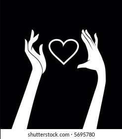Hands and Heart on black background