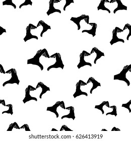 hands in heart shape pattern