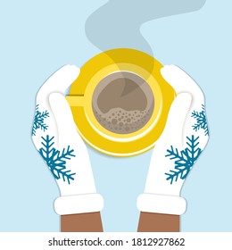 Hands hold cup of coffee in knitted winter gloves. Winter cozy illustration of drinking coffee, cappuccino.