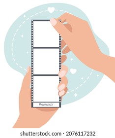 Hands hold a film for inserting a photo. Template for photos. Moments, memories. Vector illustration.