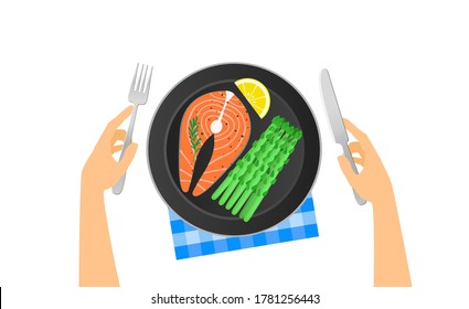 hands hold fork and knife salmon steak lemon slice and asparagus on black plate healhy food top view vector illustration