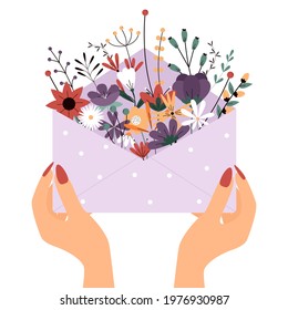 Hands hold a paper envelope with flowers. Summer composition. Vector greeting card on white background
