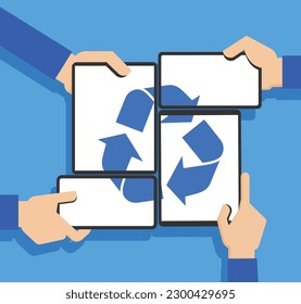 Hands hold a tablet and mobile phone on the screens of which there is a recycling icon. Concept of modern communication devices and recycling symbol.