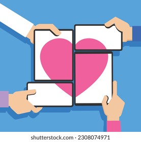 Hands hold a tablet and mobile phone on the screens of which there is a heart icon. Concept of modern communication devices and heart symbol.