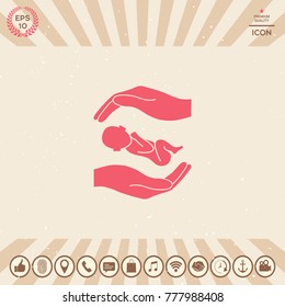 Hands holding baby