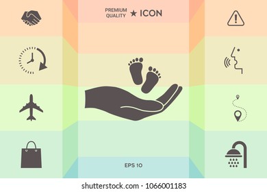 Hands holding baby foot