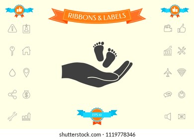 Hands holding baby foot