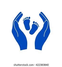 Hands holding baby foot - protection symbol.