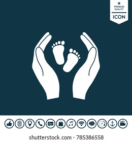 Hands holding baby foot - protection symbol