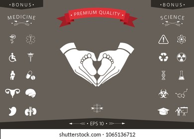 Hands holding baby - protection symbol. Heart shape made with hands