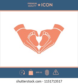 Hands holding baby - protection symbol. Heart shape made with hands
