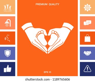 Hands holding baby - protection symbol. Heart shape made with hands