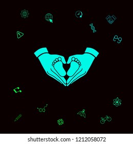 Hands holding baby - protection symbol. Heart shape made with hands