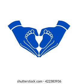 Hands holding baby - protection symbol. Heart shape made with hands.