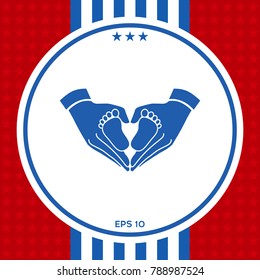 Hands holding baby - protection symbol. Heart shape made with hands