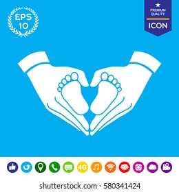 Hands holding baby symbol. Heart shape.