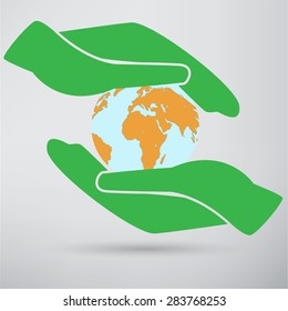 Hands holding a blue earth