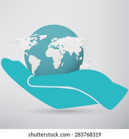 Hands holding a blue earth