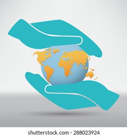 Hands holding a blue earth