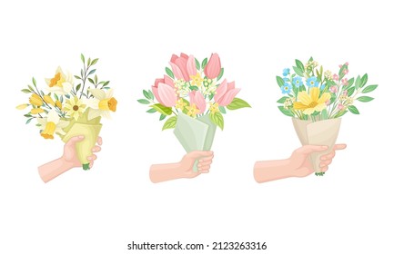 Hands holding bouquet of beautiful delicate wildflowers set vector illustration