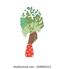 Hands holding bouquet composition of branches of tropical plants, leaves. Female hand holding flowers. Floral decorative design element isolated on white background. Elegant summer gift, greating card