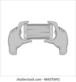 Hands holding cell phone icon in black monochrome style isolated on white background. Communication symbol vector illustration