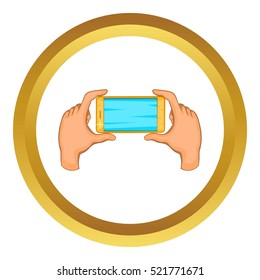 Hands holding cell phone vector icon in golden circle, cartoon style isolated on white background