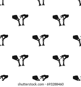 Hands holding chess pieces. Chess single icon in black style vector symbol stock illustration web.