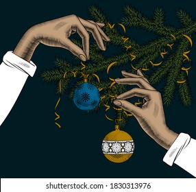 Hands holding a Christmas tree ball with a ribbon. Vintage engraving stylized drawing. Vector illustration.