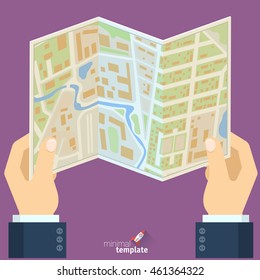 Manos sosteniendo el mapa de la ciudad ilustración vectorial de diseño plano. Mapa de ubicación, ruta, dirección, conceptos de destino de viaje para navegación turística, gps.