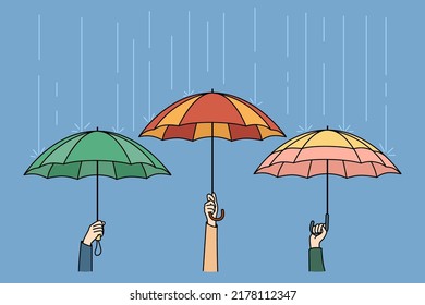 Hands Holding Colorful Umbrellas Hiding From Rain In City. People Outside On Rainy Weather. Storm And Safety Concept. Vector Illustration. 