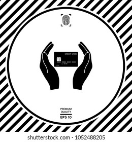 Hands holding credit card