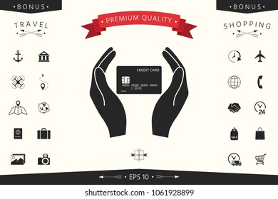 Hands holding credit card