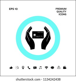 Hands holding credit card