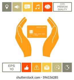 Hands holding credit card