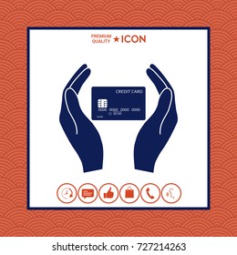 Hands holding credit card