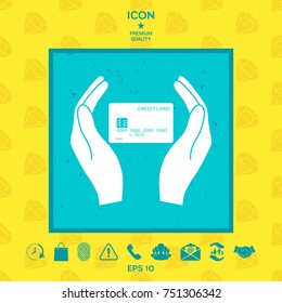 Hands holding credit card