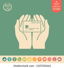 Hands holding credit card - icon