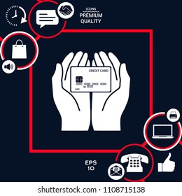 Hands holding credit card - icon