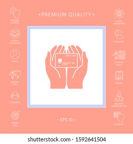 Hands holding credit card - icon. Graphic elements for your design