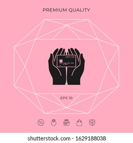 Hands holding credit card - icon. Graphic elements for your design