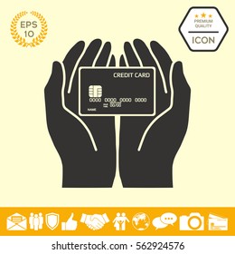 Hands holding credit card - icon