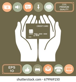 Hands holding credit card. Icon