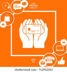 Hands holding credit card - icon